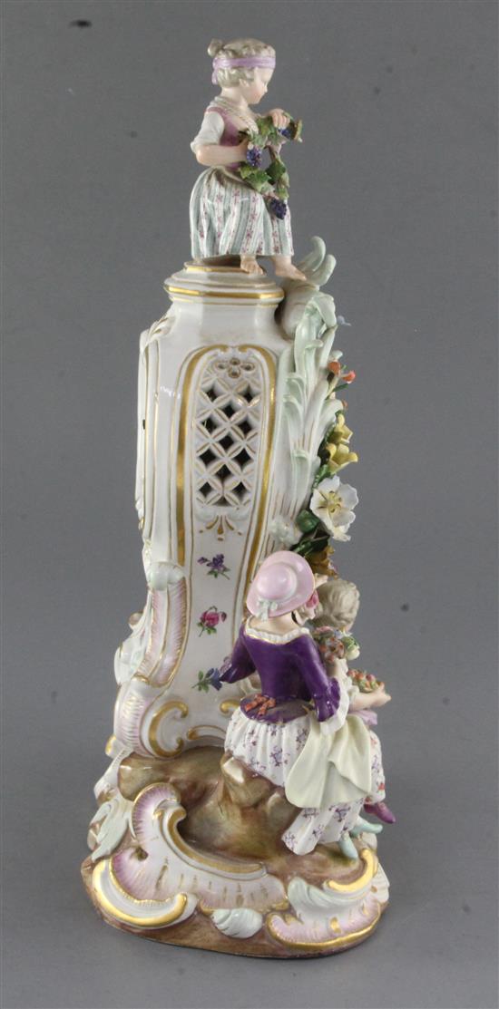 A Meissen porcelain mantel clock case, 19th century height 38cm, typical tiny losses